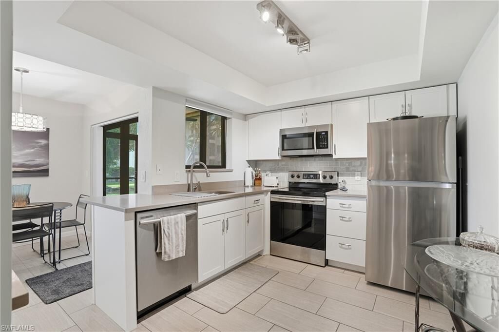 Property Photo:  3645 Boca Ciega Dr 114  FL 34112 