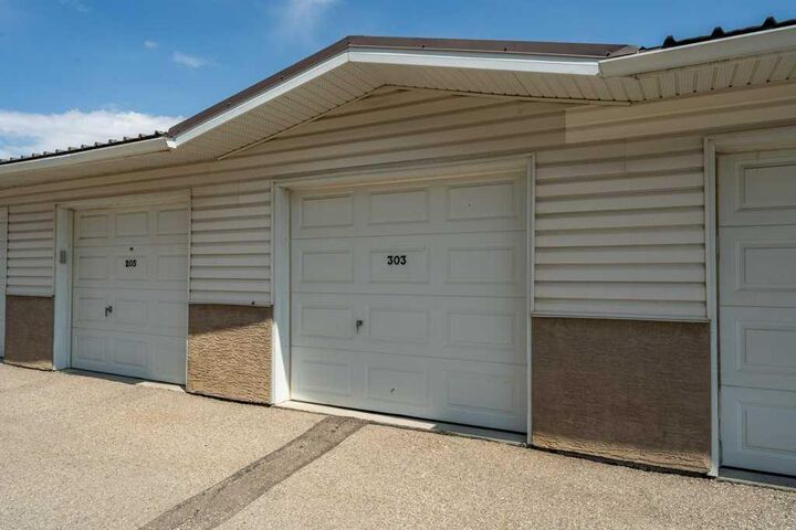 Property Photo: 300 Edwards Way NW 303 AB T4B 3B4