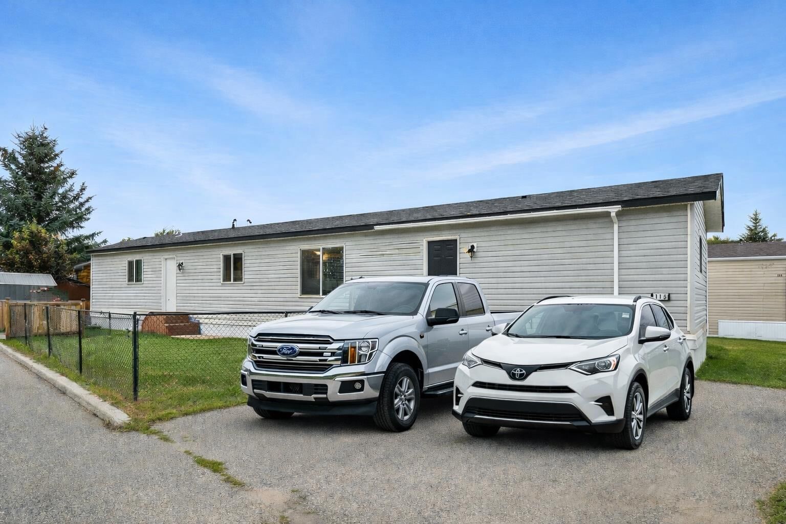 Property Photo: 113 Heritage Drive AB T1S 1M4