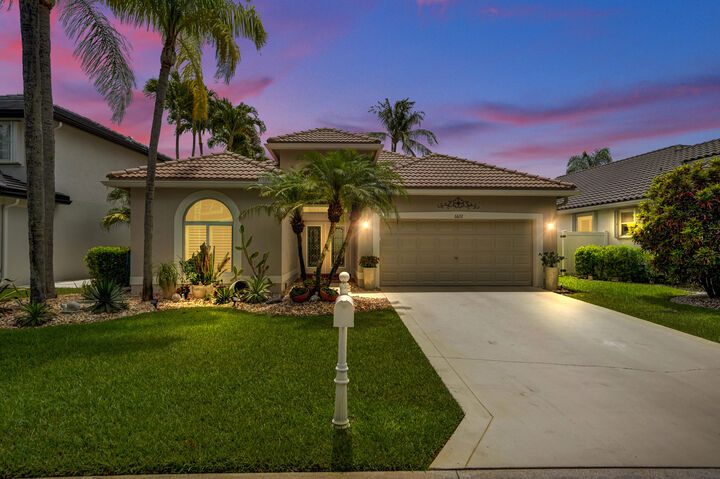 Property Photo:  6672 Remington Place  FL 33463 