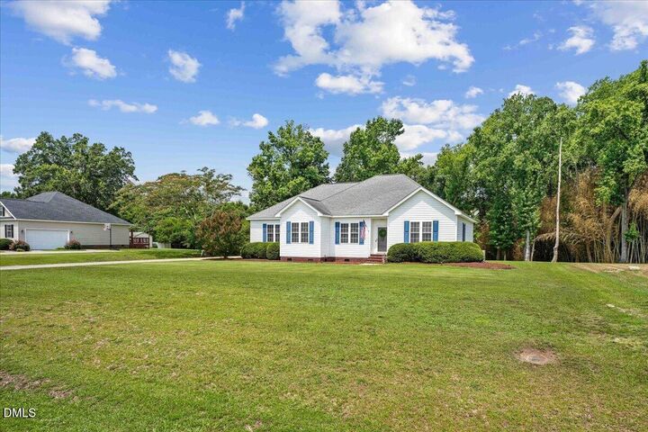 Property Photo:  205 Millbrook Village Drive  NC 27530 