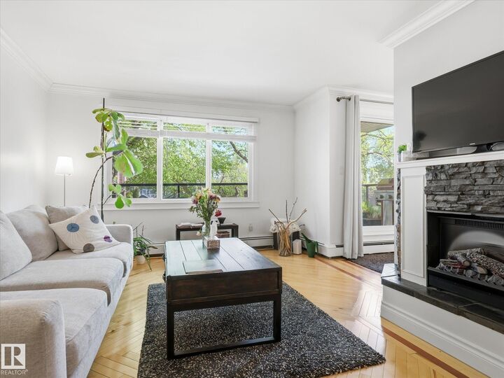Property Photo:  10003 87 Avenue NW 301  AB T6E 2P1 