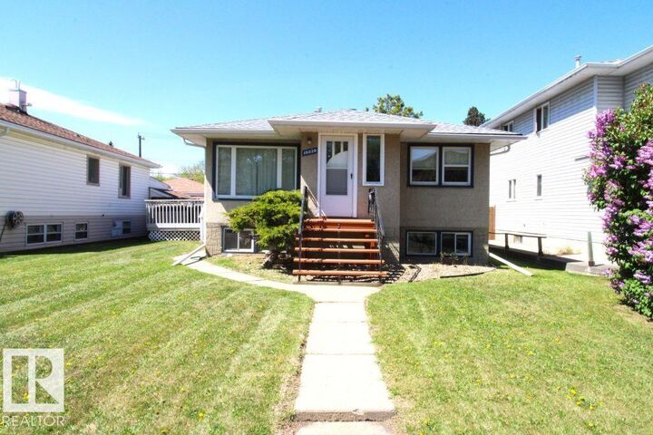 Property Photo:  10320 79 Street NW  AB T6A 3G8 