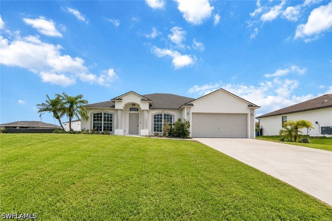Property Photo:  221 NW 29th Place  FL 33993 