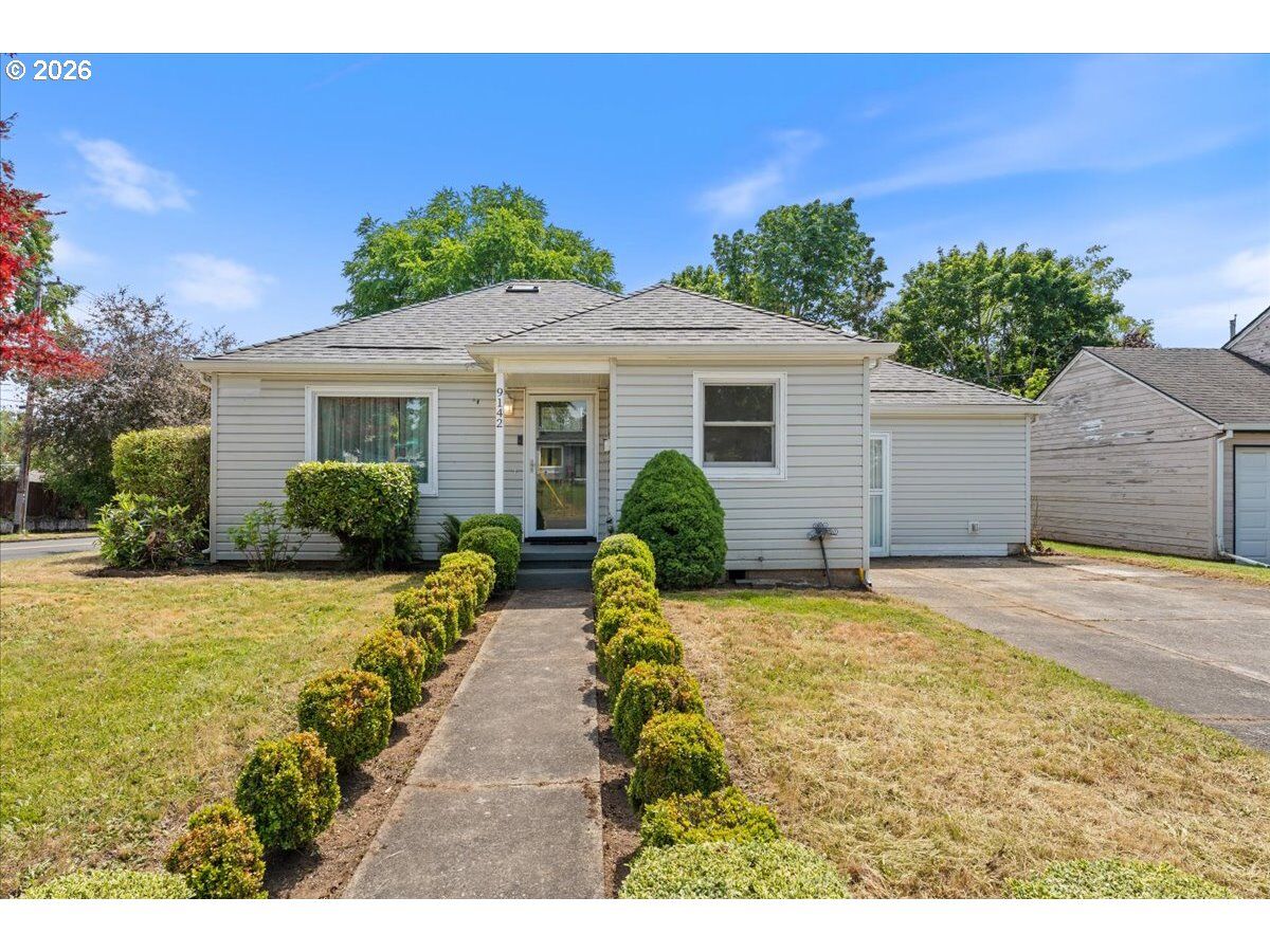 Property Photo: 9142 SE Washington St OR 97216