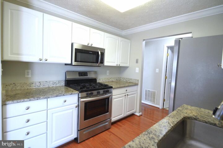 Property Photo:  705 Harvest Run Drive 203  MD 21113 