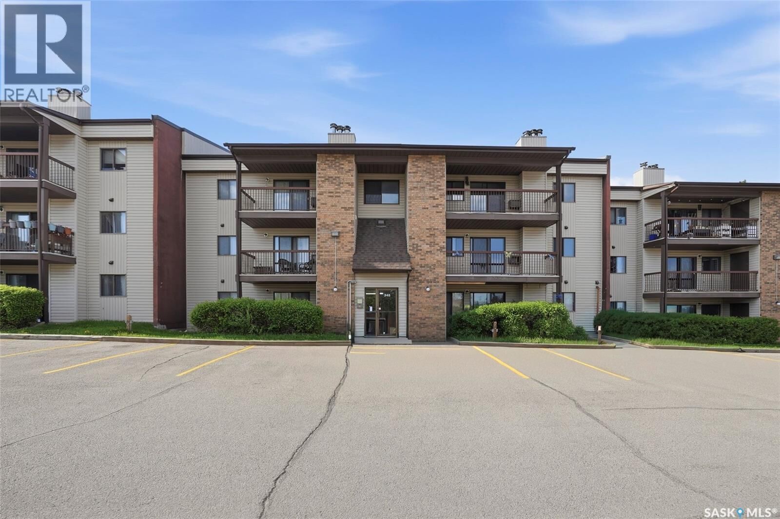Property Photo:  202 345 Kingsmere Boulevard  SK S7J 4J6 
