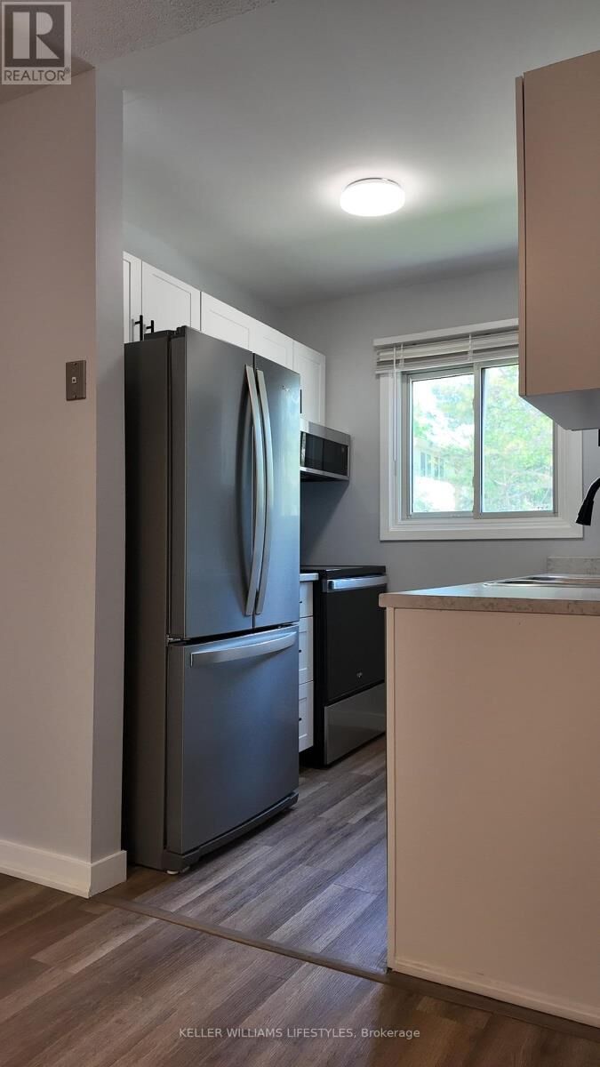 Property Photo: 166 Southdale Road West 58 ON N6J 2J1