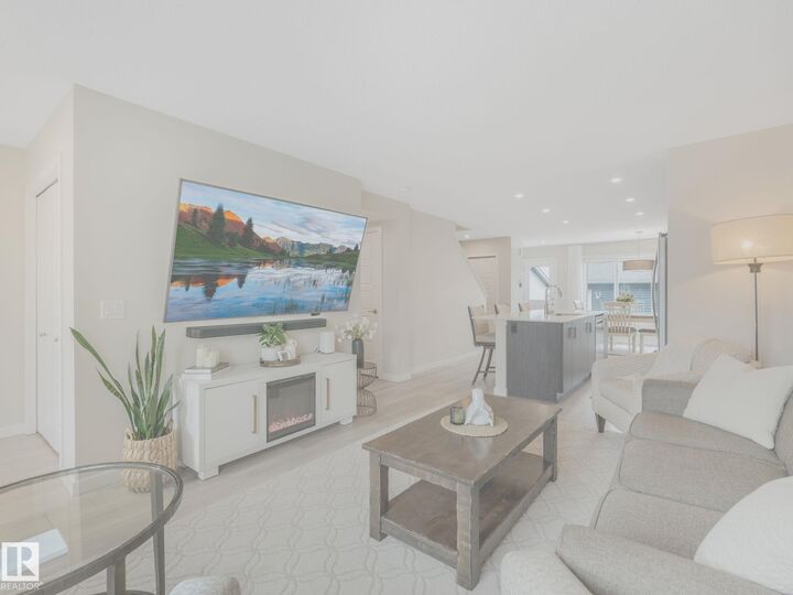 Property Photo: 2426 Trumpeter Way NW AB T5S 0R9