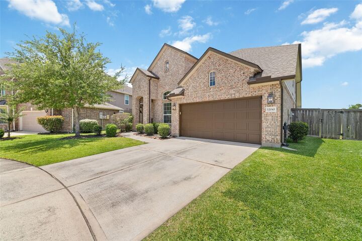 Property Photo: 12043 Tree Top Hills Lane TX 77377