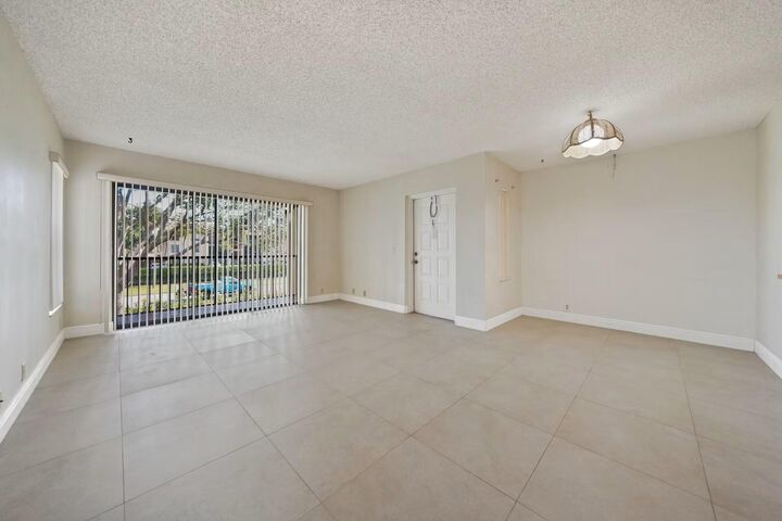 Property Photo:  802 Sky Pine Way F2  FL 33415 