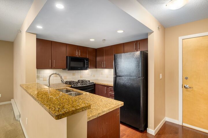 Property Photo: 120 Milross Avenue 1703 BC V6A 4K7