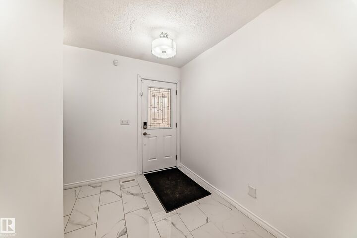 Property Photo:  9815 159 Avenue NW  AB T5X 4V6 