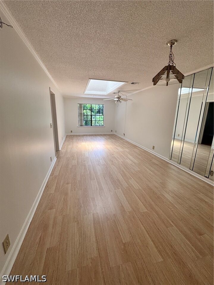 Property Photo:  5294 Treetops Drive I-203  FL 34113 
