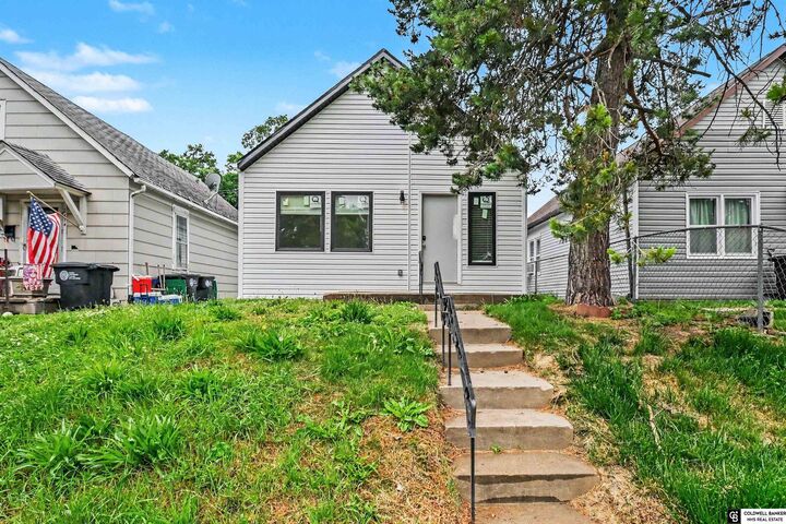 Property Photo: 2612 S 12th Street NE 68108