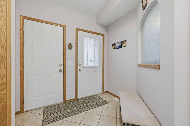 Property Photo:  1008 Woodside Way NW 22  AB T4B 2T8 