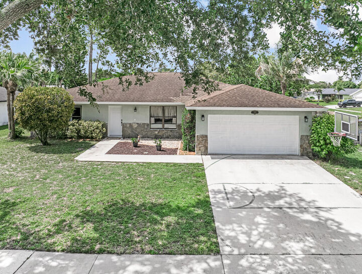 Property Photo:  100 Greenwood Court  FL 33411 