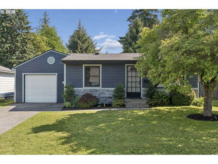 Property Photo:  10910 NE Knott St  OR 97220 