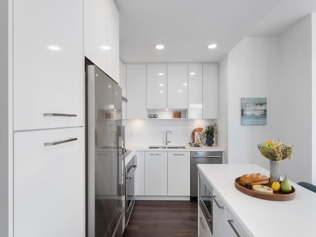 Property Photo: 518 Clarke Road 2101 BC V3J 0S7