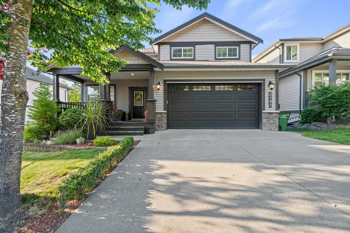6143 Rexford Drive — photo 1
