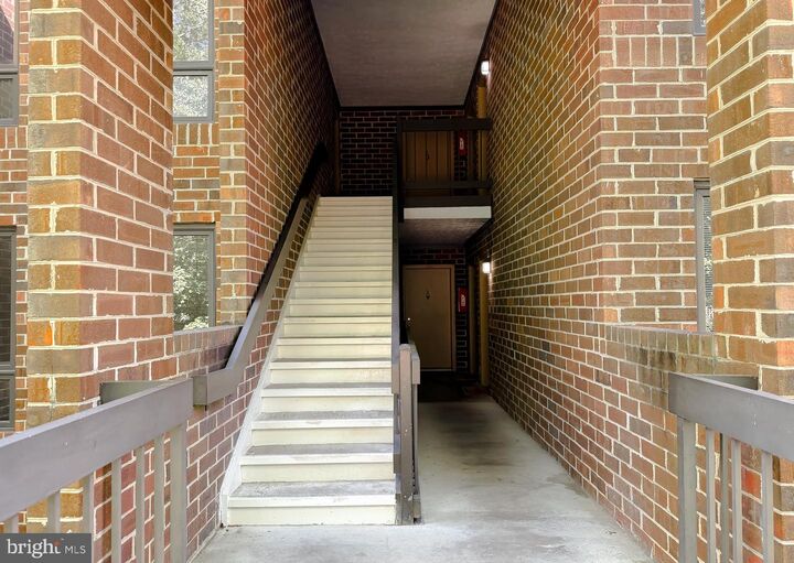 Property Photo:  23250 Chestnut Oak Court 8C  MD 20619 
