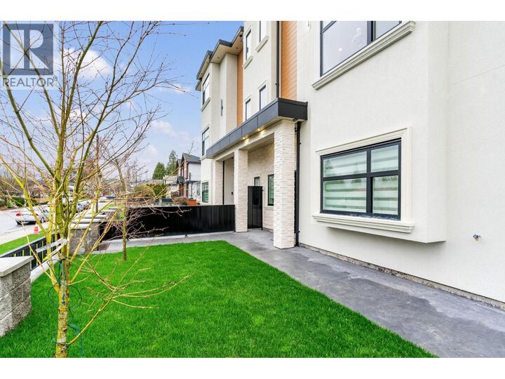 Property Photo:  8464 15th Avenue 2  BC V3N 1Y2 