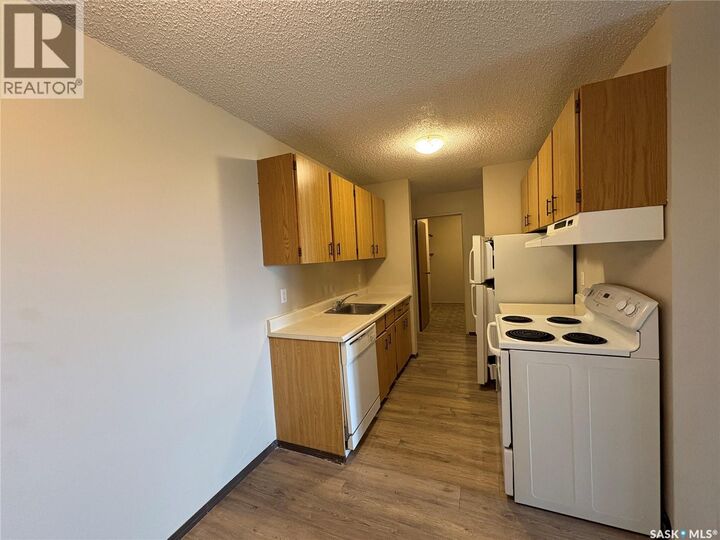 Property Photo:  303 1140 9th Avenue NE  SK S9H 2S9 