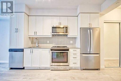 Property Photo:  7895 Jane Street 310  ON L4K 2M7 