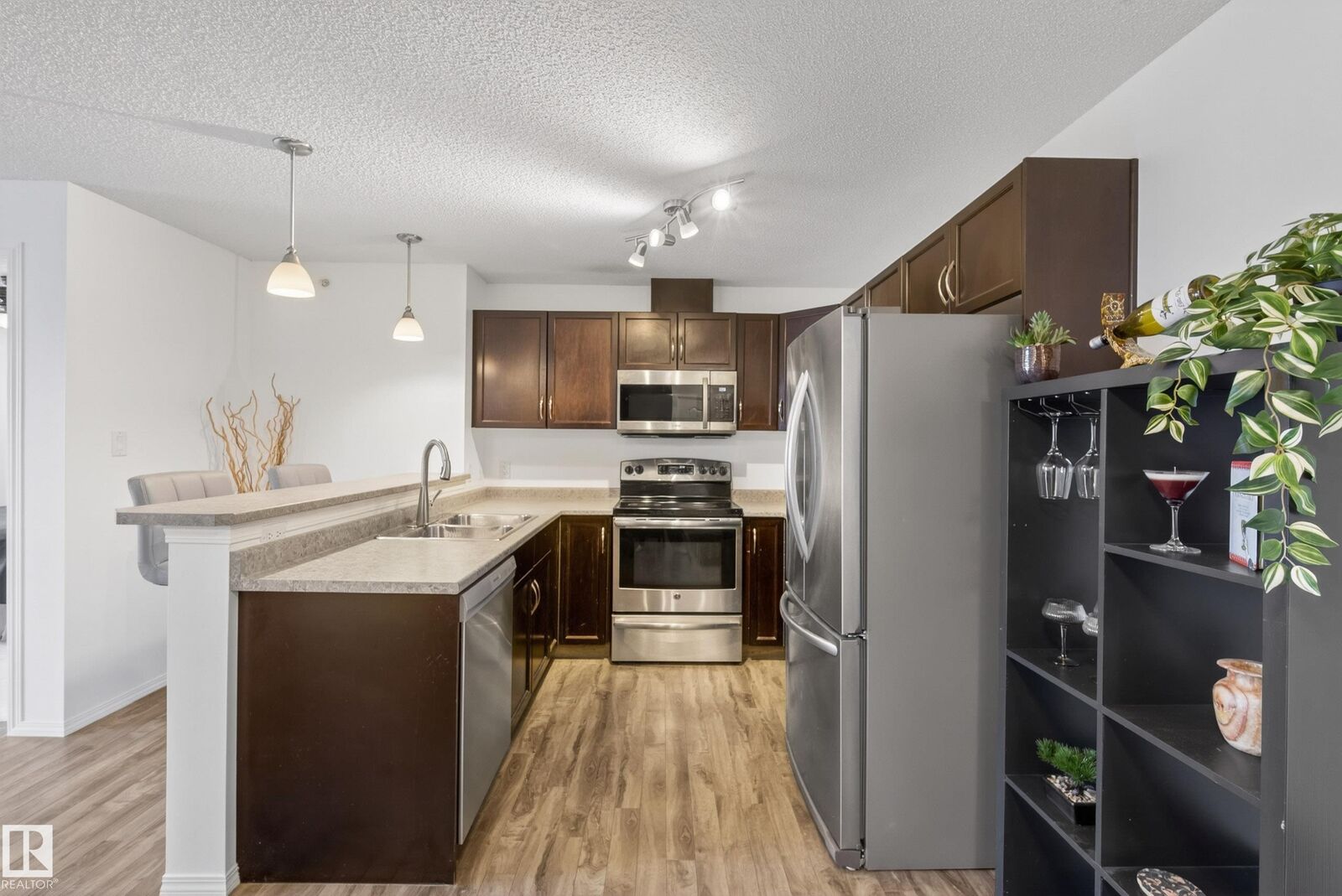 Property Photo:  5951 165 Avenue NW 414  AB T5Y 0J6 