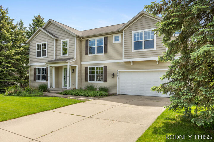 Property Photo:  3030 Sunchase Avenue  MI 49426 