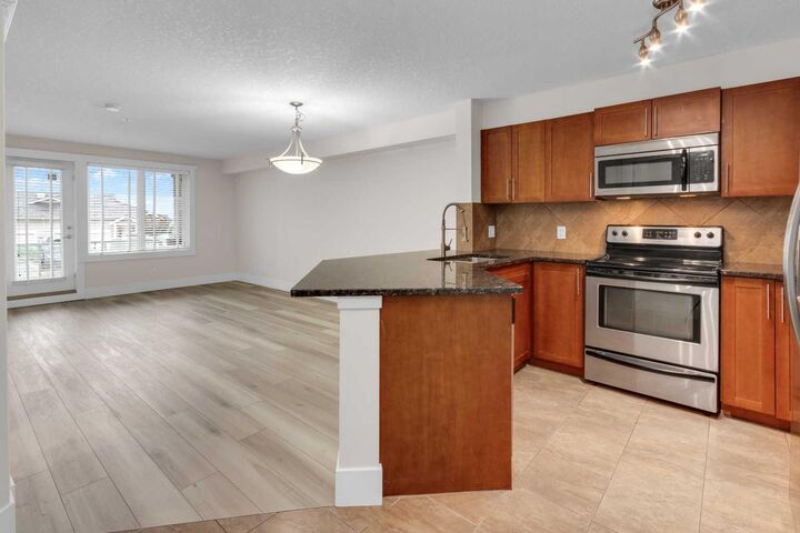 Property Photo: 500 Rocky Vista Gardens NW 102 AB T3G 0C3