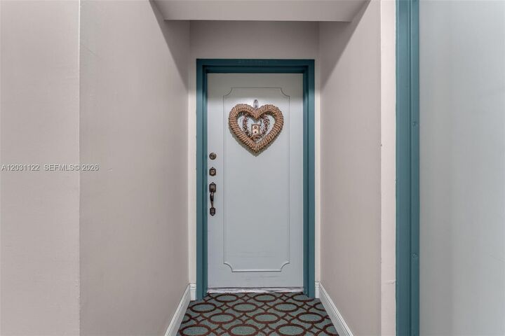 Property Photo:  6911 SW 147th Ave 2H  FL 33193 