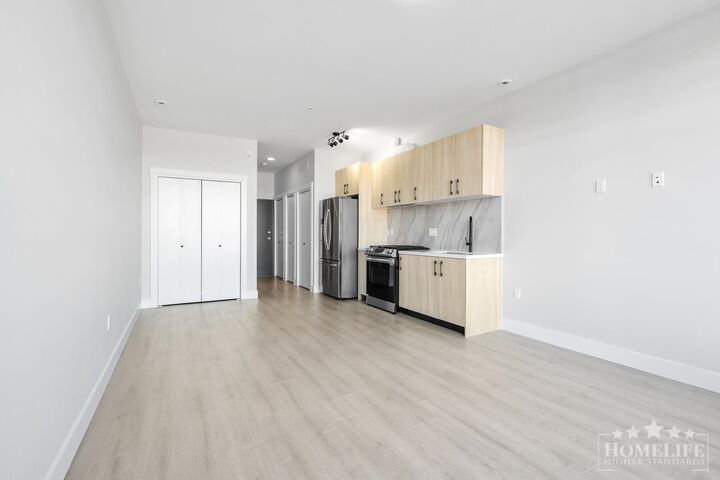 Property Photo:  14858 60 Avenue 213  BC V3S 0B5 