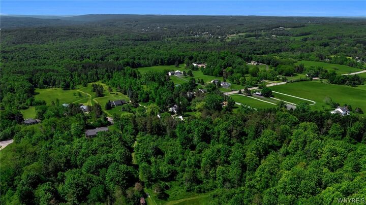 Property Photo:  706 Jewett Holmwood Road  NY 14052 