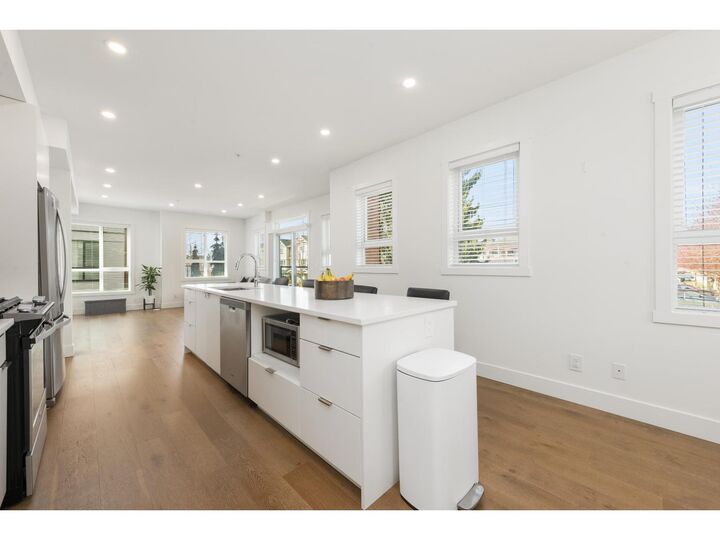 Property Photo:  19790 55A Avenue 9  BC V3A 0K6 