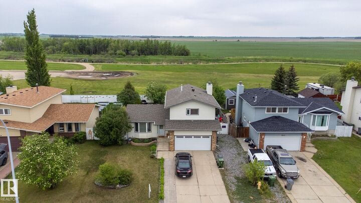 Property Photo:  8902 107 Avenue  AB T8R 1C6 