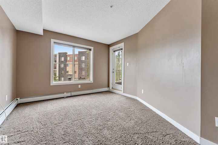 Property Photo: 11812 22 Avenue SW 209 AB T6W 2A2