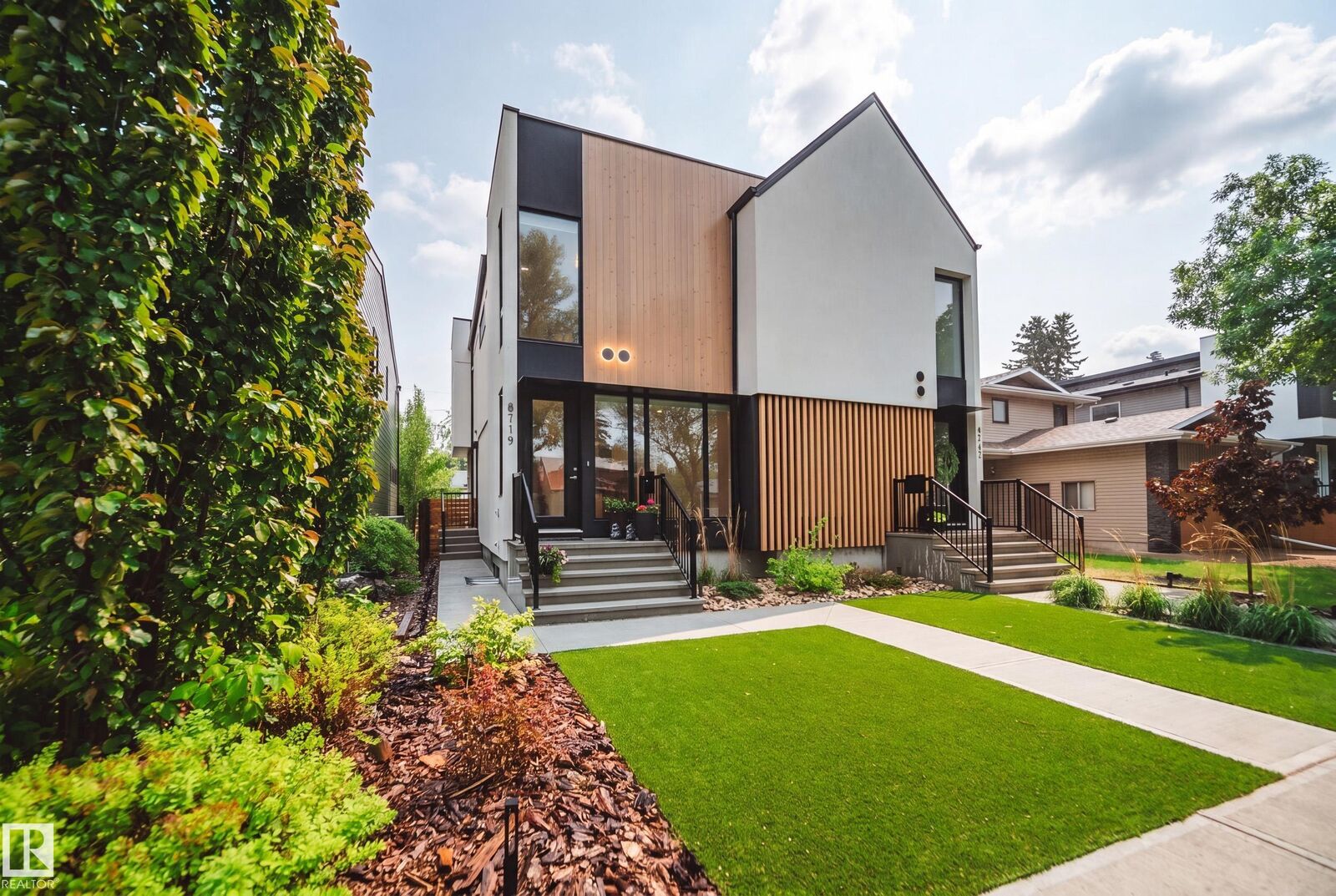 Property Photo:  8719 83 Avenue NW  AB T6C 1B2 