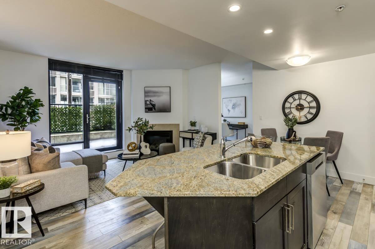 Property Photo:  11933 Jasper Avenue NW 205  AB T5K 0P1 