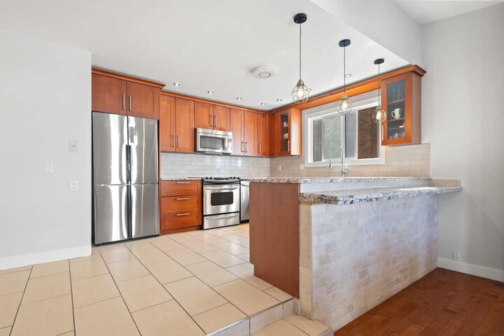 Property Photo: 208 Woodpark Place SW AB T2M 2S5