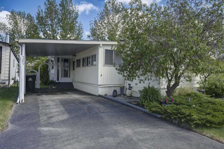 Property Photo: 99 Arbour Lake Road NW 221 AB T3G 4E4