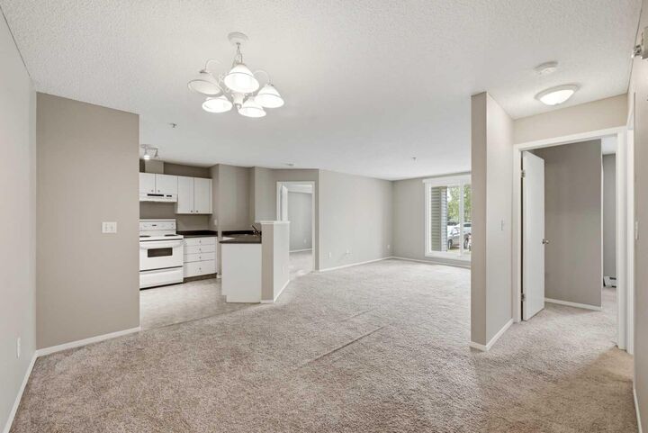 Property Photo:  604 8 Street SW 4106  AB T4B 2W4 