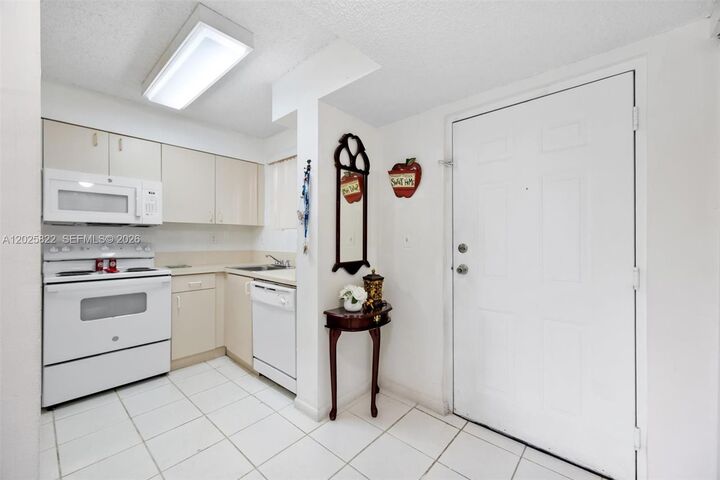 Property Photo:  14951 SW 82nd Ln 17-403  FL 33193 