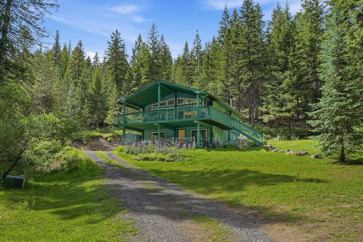 Property Photo: 10808 E Deer Creek Rd Aka Hartley Lane WA 99003