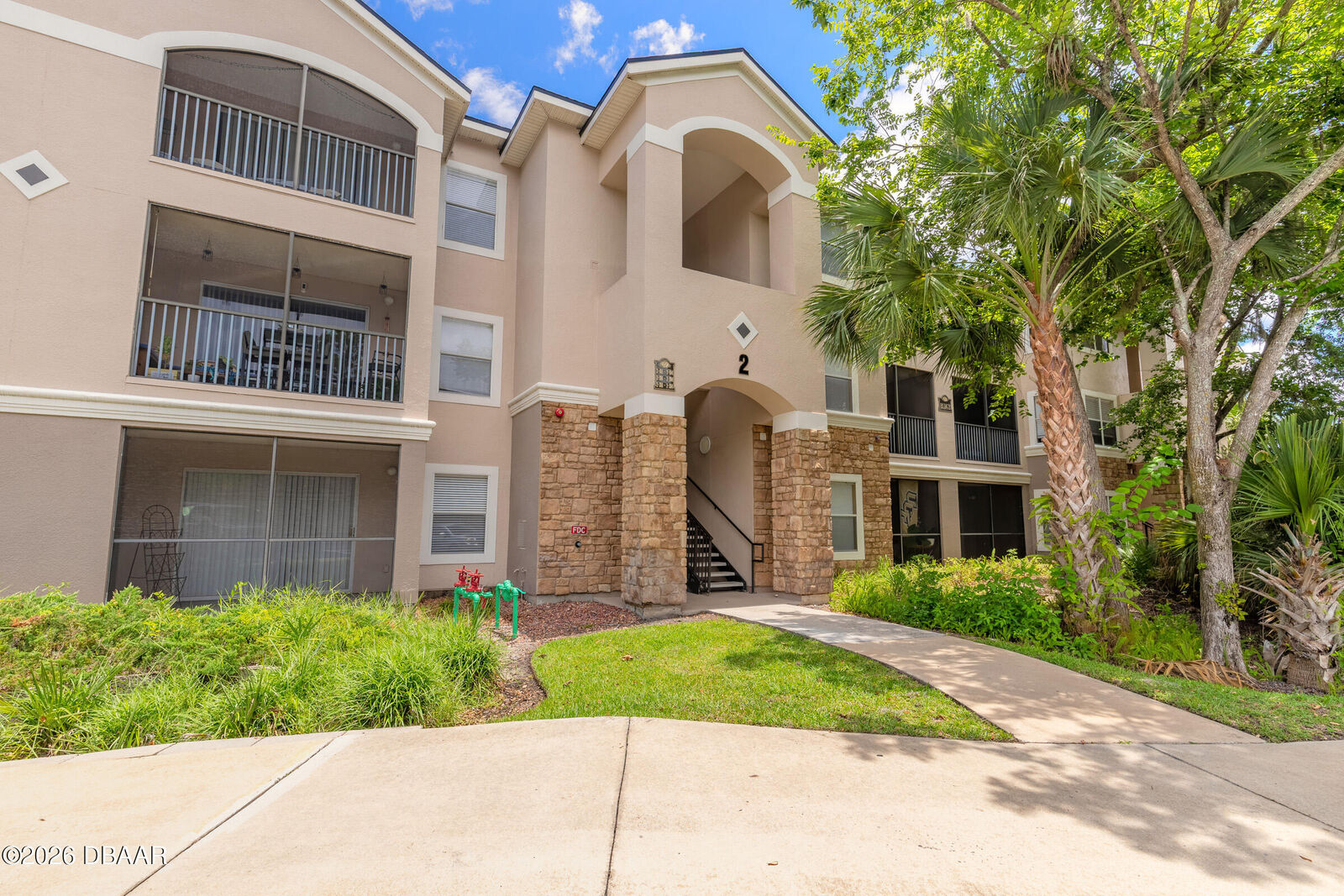 Property Photo:  940 Village Trail 2-208  FL 32127 