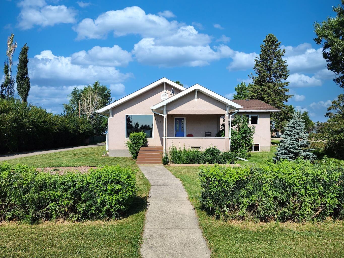 Property Photo: 4813 4 Street W AB T0L 0T0