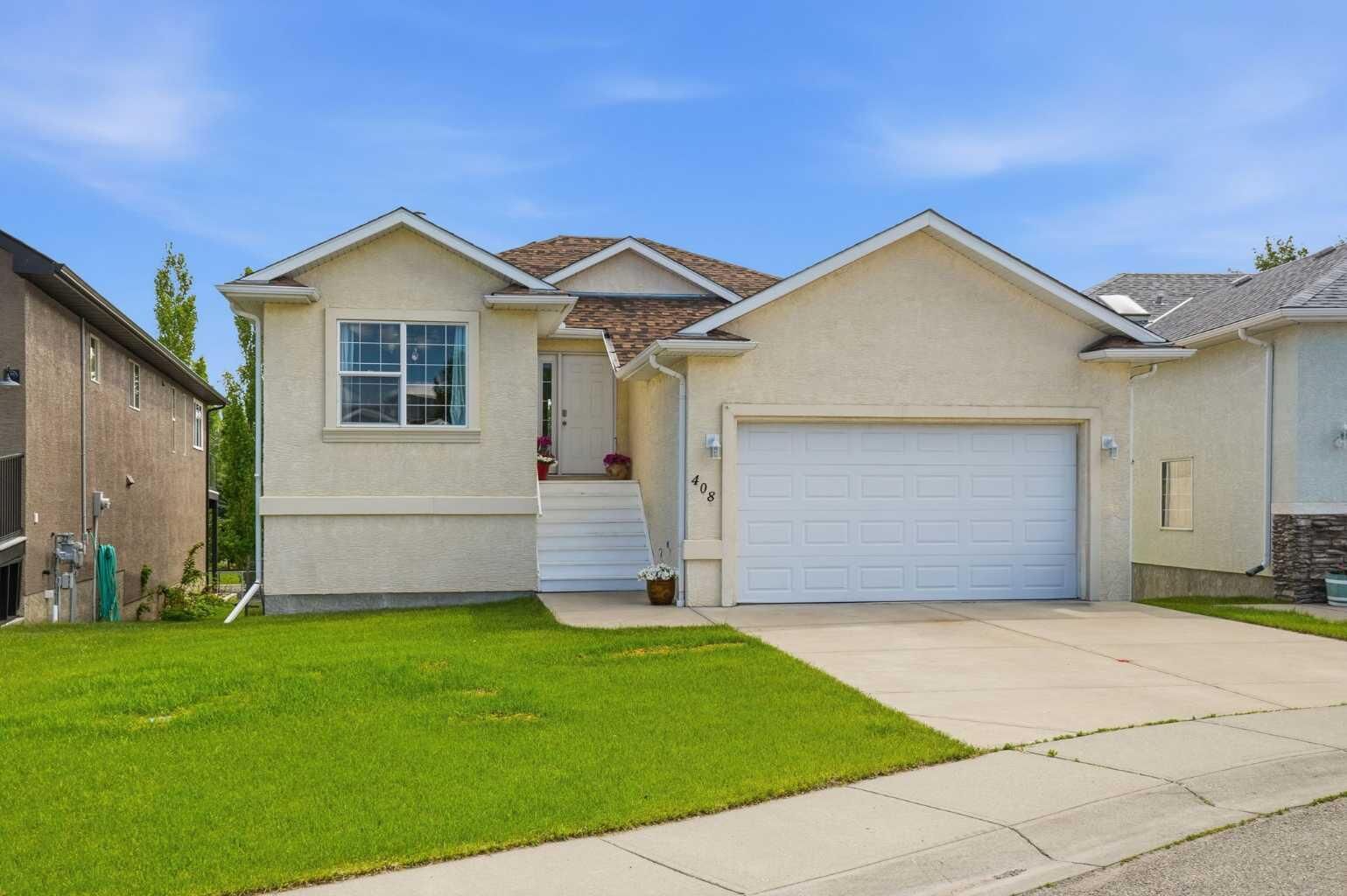Property Photo:  408 Lineham Acres Bay NW  AB T1V 1T3 
