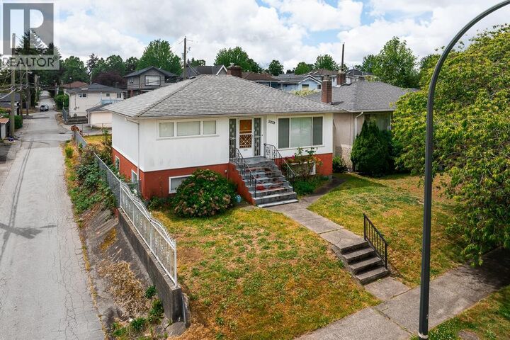 Property Photo:  3678 East 25th Avenue  BC V5R 1K5 