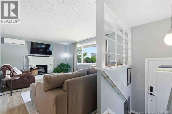Property Photo: 99 Sunset Drive NB E3A 1A2