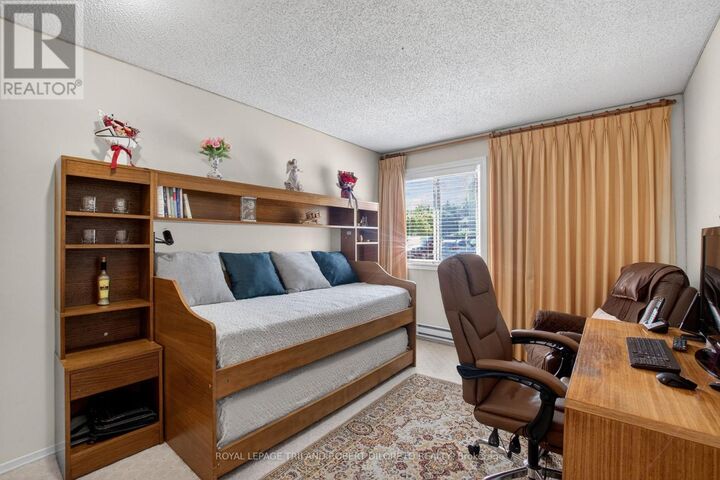 Property Photo:  731 Deveron Crescent 103  ON N5Z 4X6 